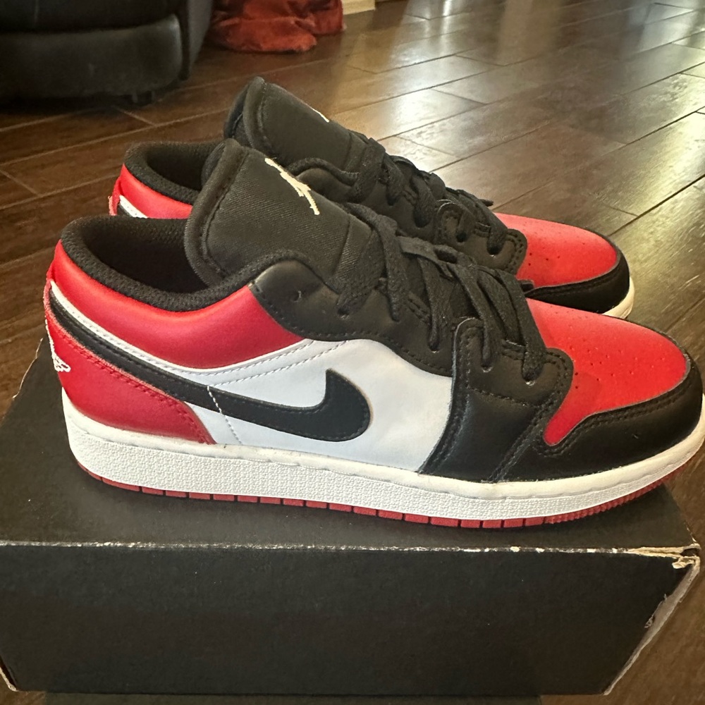 Air Jordan one low size 4 youth brand new